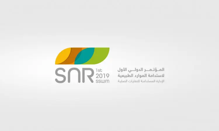 The logo of the First International Conference on Sustainability of Natural Resources 2019 (SNR), featuring abstract plant leaves and Goal 12, with bilingual text in Arabic and English on a light gray background.