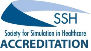 The logo of the accreditation of the Specialized Society for Simulation in Healthcare (SSH) carries a blue linear design with clear text SSH Society for Simulation in Healthcare Accreditation, highlighting the full accreditation of the simulation center in the city The logo shows the official and professional commitment of Qassim University to this achievement, taking care to highlight the national identity by wearing the Saudi Shemagh or the Saudi Ghutrah.