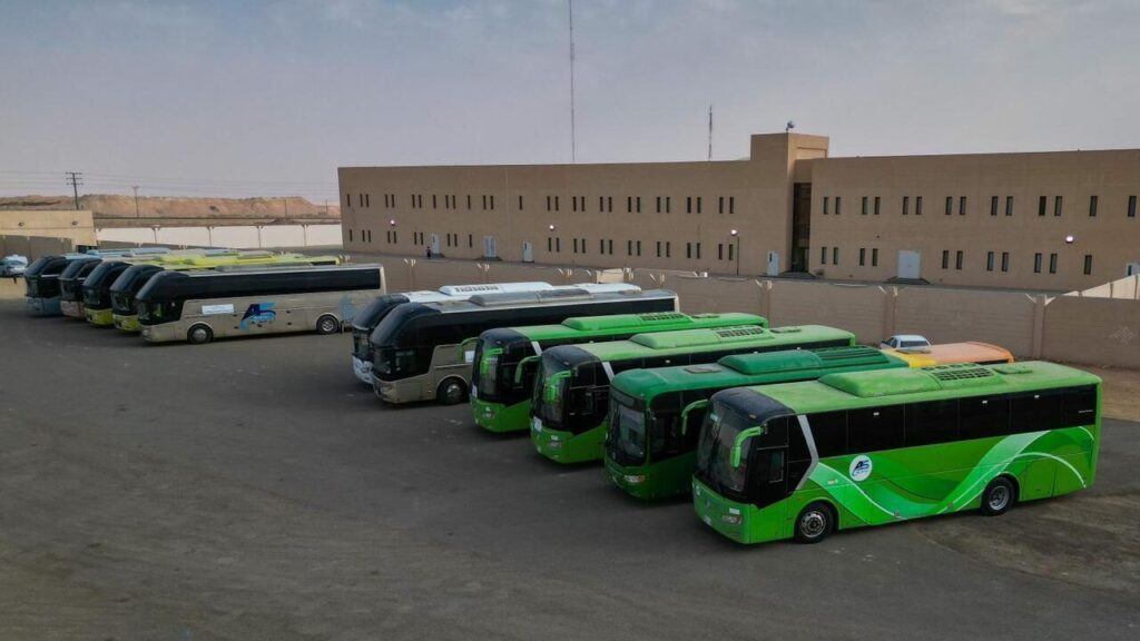 Qassim University's university transportation for female students in the parking lot in preparation for study tours.