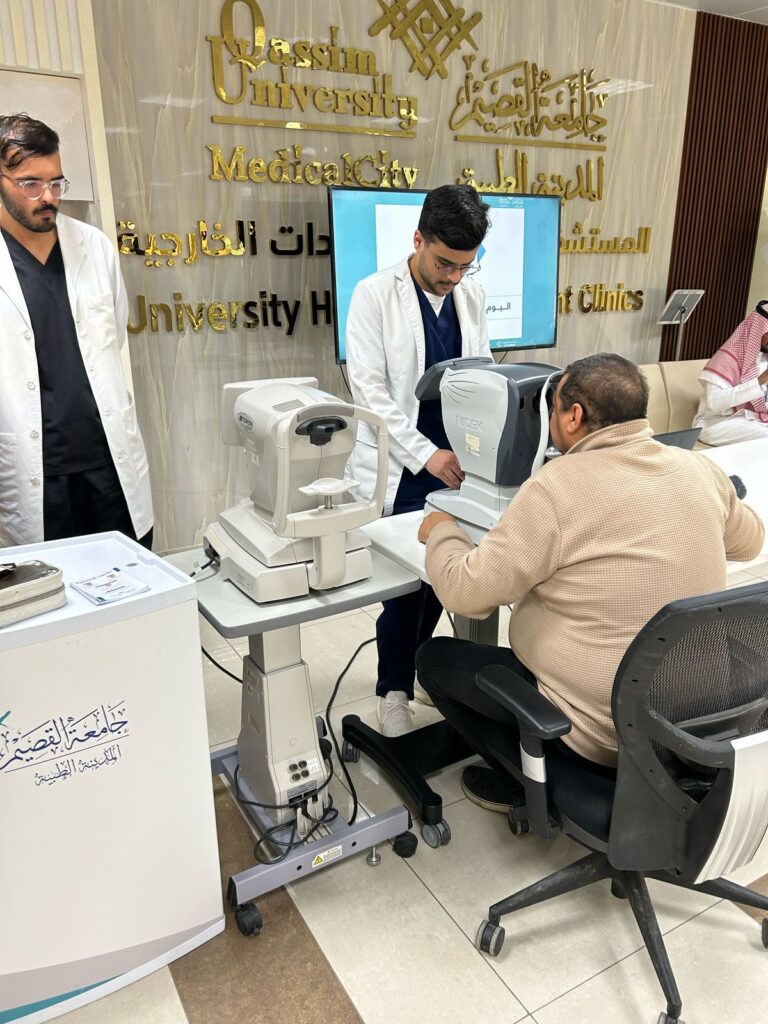 An optical examination of one of the beneficiaries within the health awareness programs at Qassim University at a university clinic.