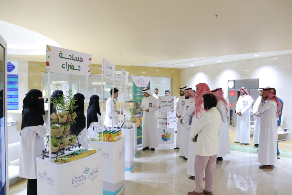Environmental and health awareness at a Qassim University academic event that promotes Islamic societal values.