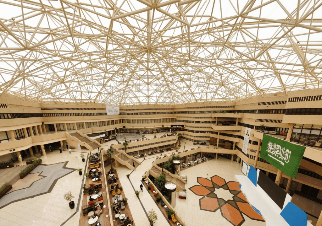 A spacious atrium at Qassim University reflects the spirit of innovation and sustainability in a Saudi academic environment.