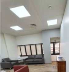 A modern office lobby at Qassim University designed for sustainable energy, suitable for academic meetings.