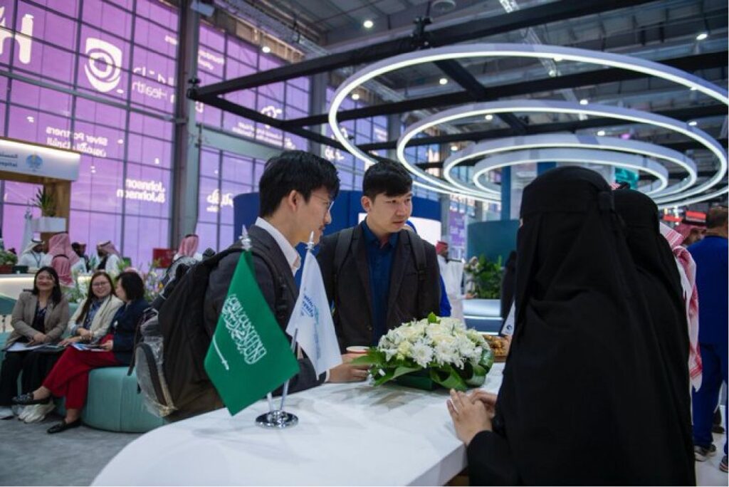 An introductory corner at Qassim University's academy highlighting Saudi and Muslim identity.