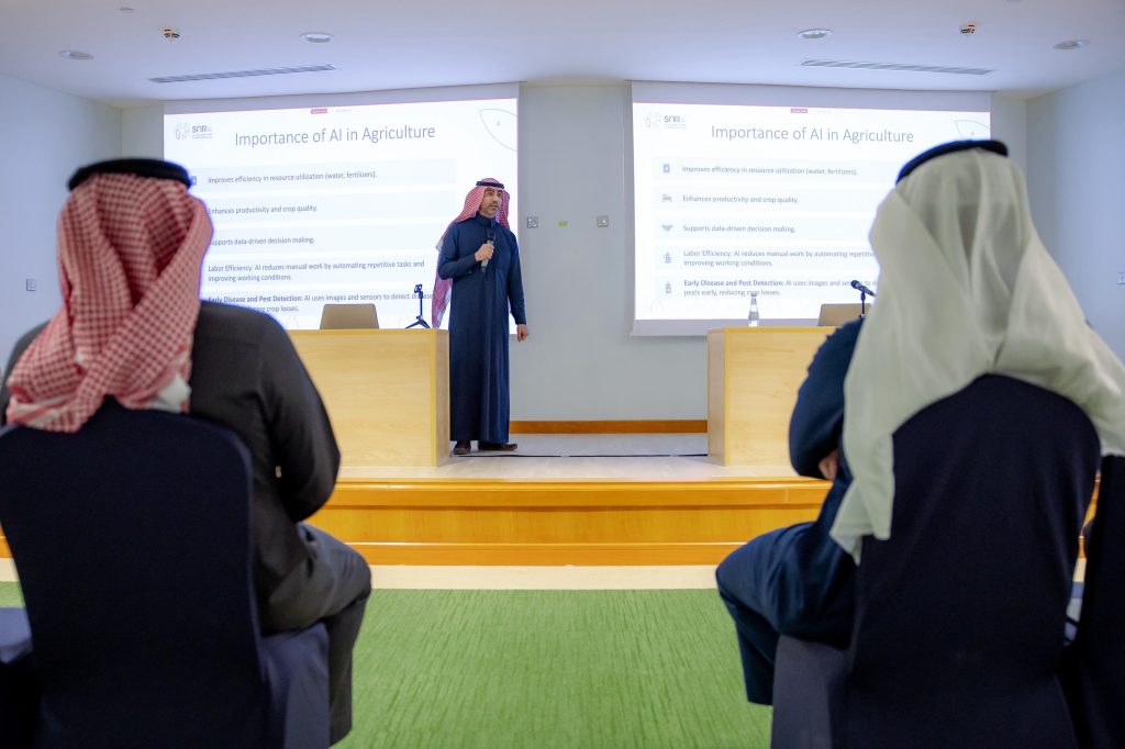 Scientific presentation on the role of artificial intelligence in agriculture at Qassim University during the Resource Sustainability Conference.