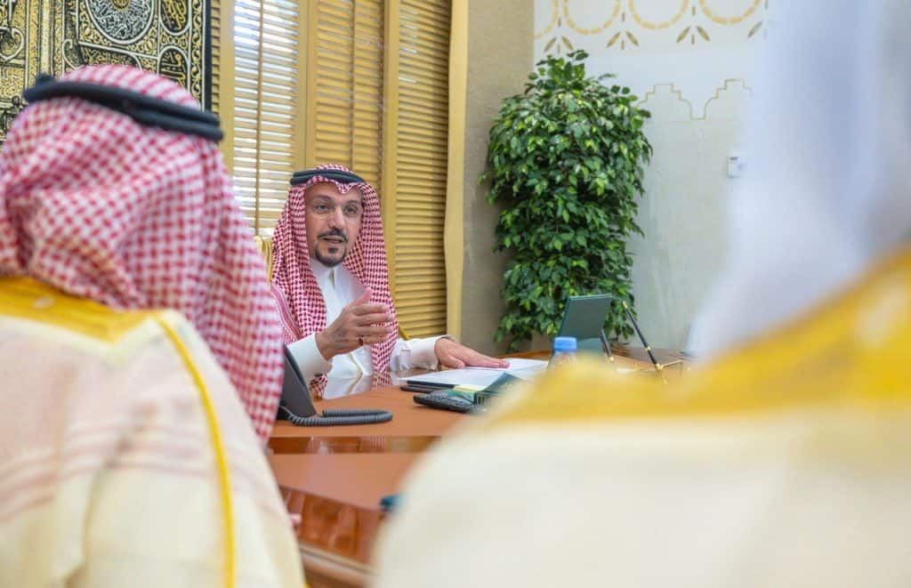 An academic meeting at Qassim University discusses educational issues in a committed Saudi environment.