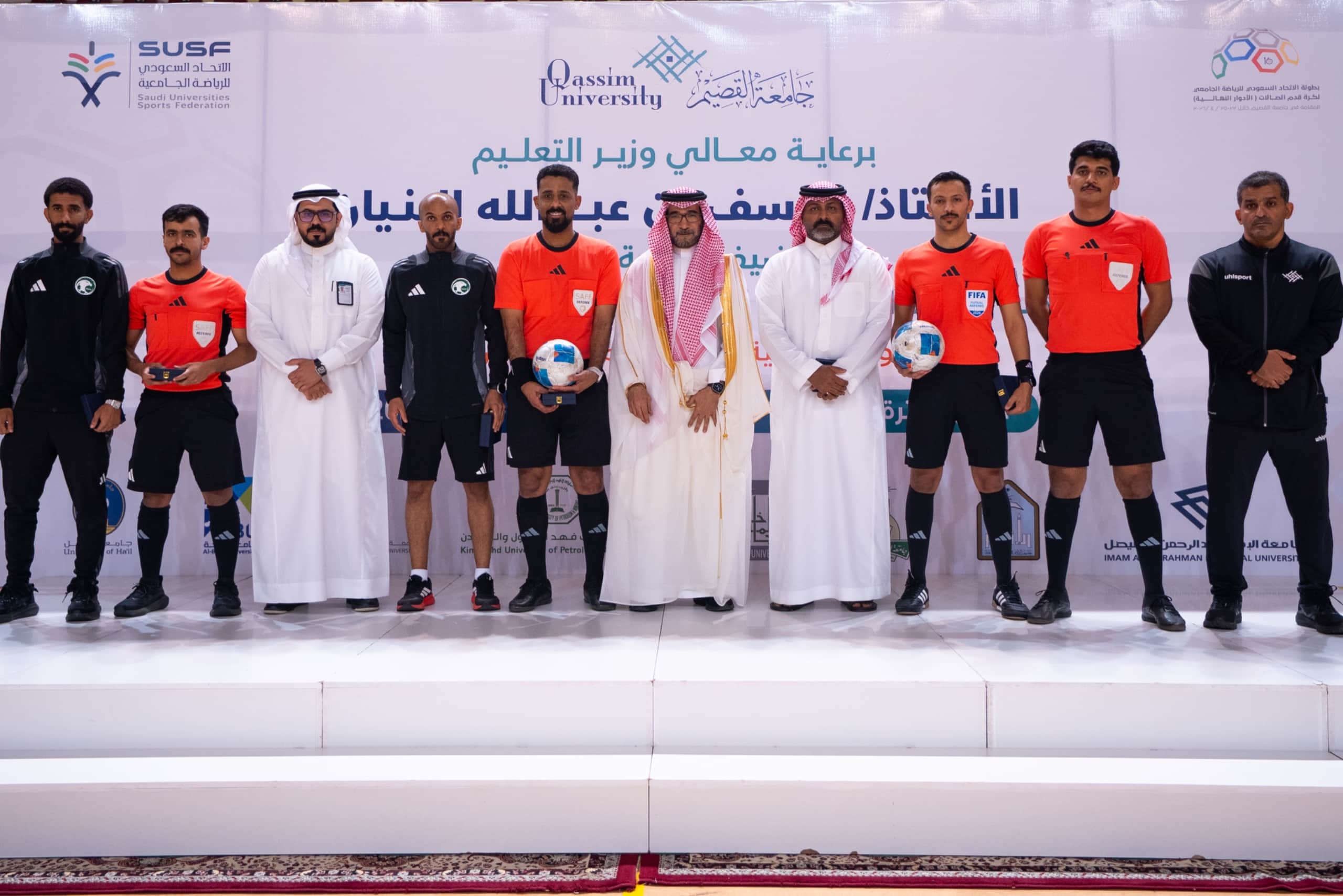 A picture of participants in an academic sports event at Qassim University as part of the Saudi Federation Championship.