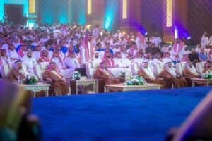 University presence at the Peoples' Heritage Festival at Qassim University, under the patronage of the region's Emir, in an official hall.