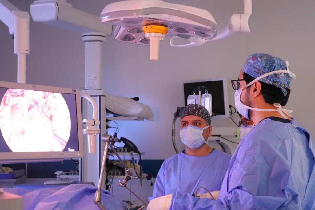 Performing a gastric bypass surgery using advanced laparoscopic techniques in the operating room at Qassim University.