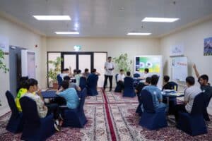 Interactive lecture in a hall at Qassim University as part of the activities of the student summer club.