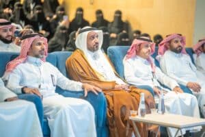 حضور أكاديمي في فعالية رسمية بجامعة القصيم مع الترتيبات التنظيمية اللازمة للاجتماع.