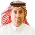 A faculty member at Qassim University while performing his academic duties in a Saudi environment.