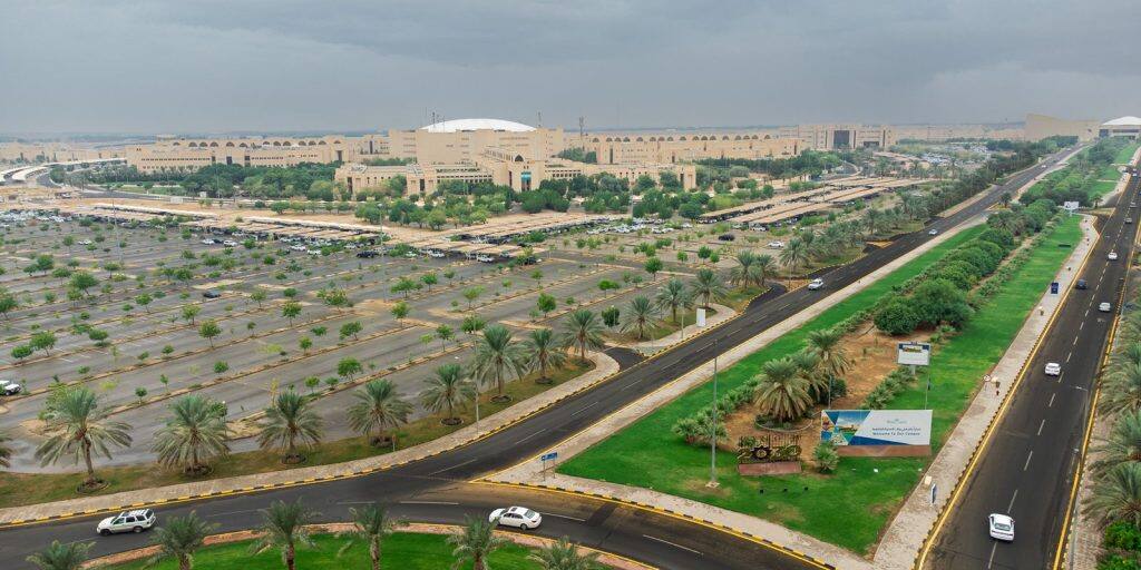 An aerial view of a campus that reflects a modern and Hindu environment at Qassim University.